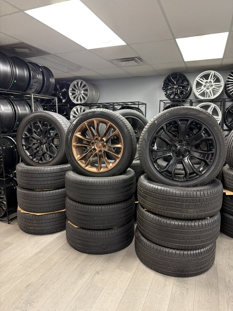 Wheel and tire packages stacked in the Fraser showroom